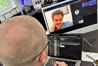 Justin Bartak leading remote cross-functional product design team through daily standup meeting and collaborative innovation session