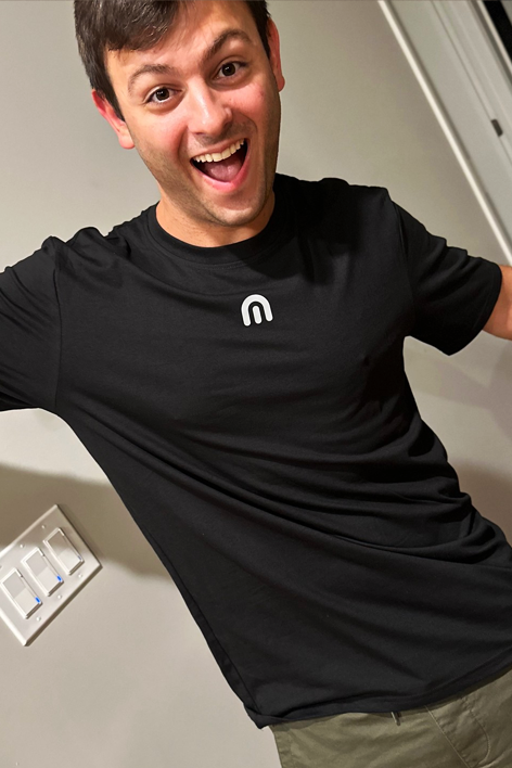 Justin Bartak conducting user experience review session with multidisciplinary team focusing on customer-centric product design principles