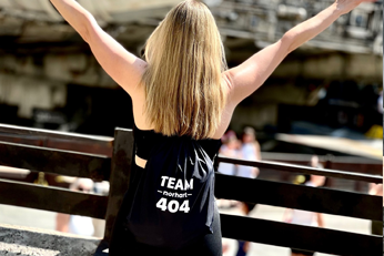 Remote team collaboration led by Justin Bartak showing distributed workforce management and virtual leadership excellence across multiple time zones